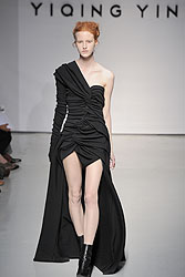 Yiqing Yin