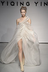 Yiqing Yin