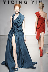 Yiqing Yin