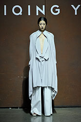 Yiqing Yin